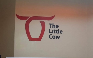 The Little Cow Reception sign